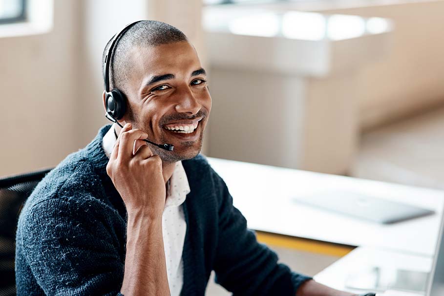 smiling man with headset